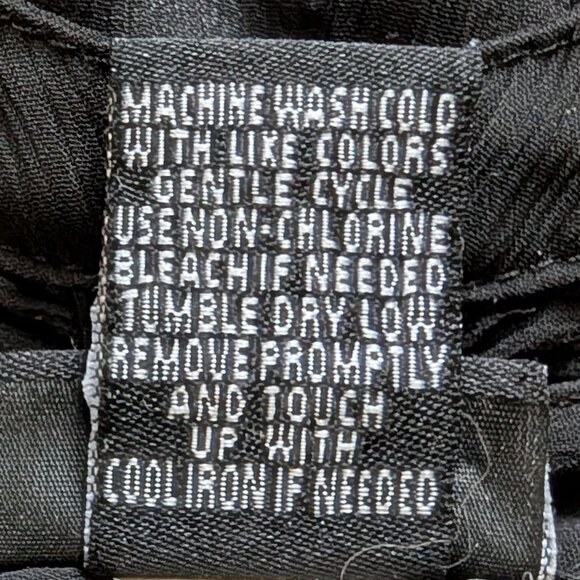 Torrid Bow Print Ruffle Front Blouse in Black & White - Picture 7 of 11